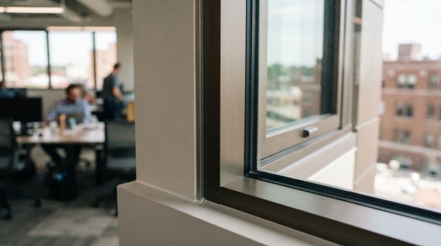 Two photos showing commercial window openings and building exterior